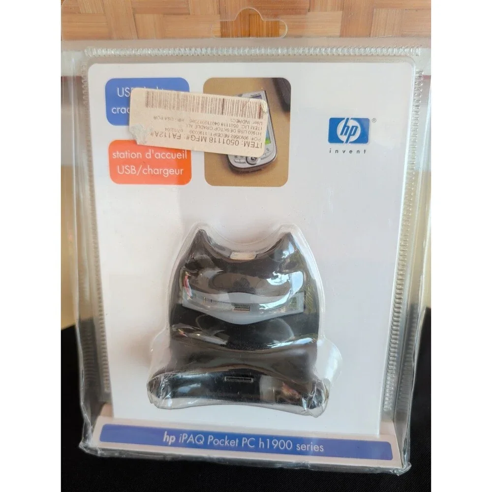 HP iPAQ Pocket PC h1900 series USB dock/charger.